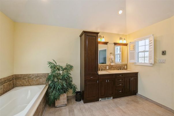 Bathroom, Dual Sink Vanities, Interior, Recessed Lighting, Wood Texture Flooring