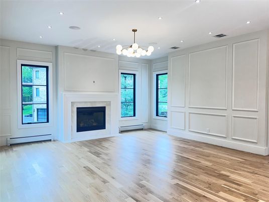 Chandelier, Empty room, Fireplace, Interior, Recessed Lighting, Wood Texture Flooring