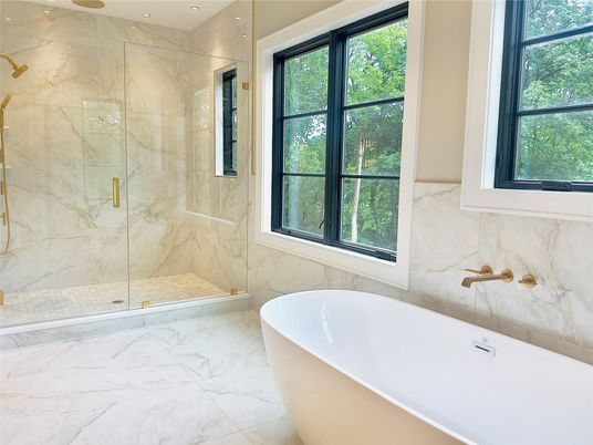 Bathroom, Free Standing Baths, Glass Shower, Interior, Marble, Marble Walls, Recessed Lighting