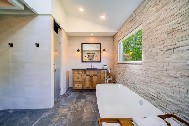 Bathroom, Free Standing Baths, Interior, Recessed Lighting, Stone Walls