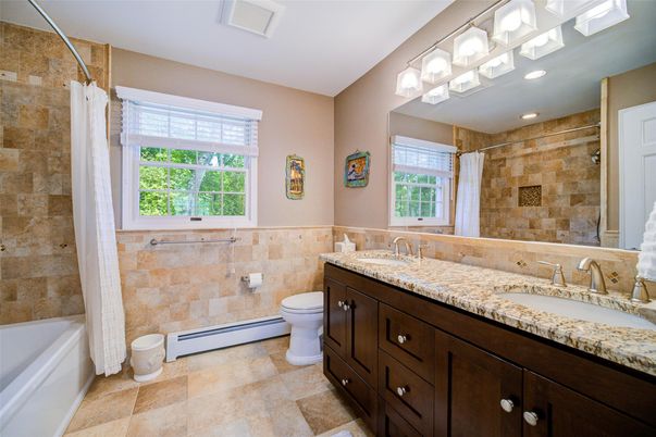 Bathroom, Dual Sink Vanities, Interior, Recessed Lighting, Stone Walls