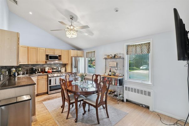 Dining room, Interior, Kitchen, Recessed Lighting, Stainless Steel Appliances, Wood Texture Flooring