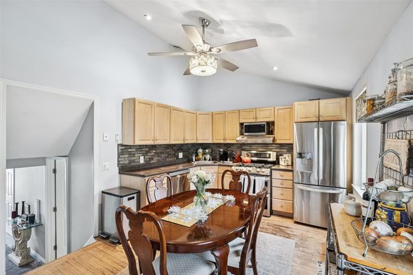 Dining room, Interior, Kitchen, Recessed Lighting, Stainless Steel Appliances, Wood Texture Flooring