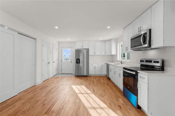 Interior, Kitchen, Recessed Lighting, Stainless Steel Appliances, Wood Texture Flooring