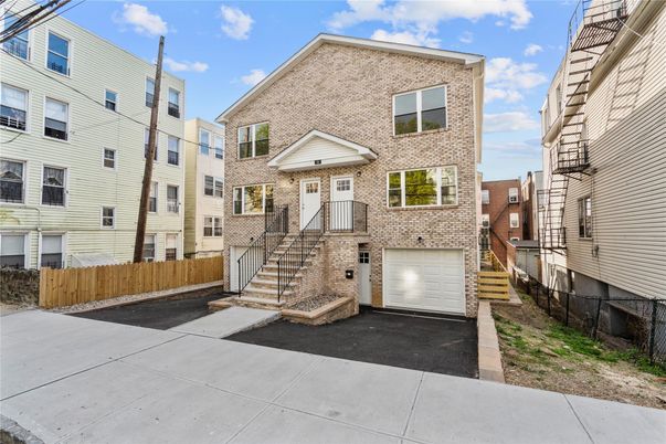 Attached, Exterior, Facade, Brick Facade, Rowhouse