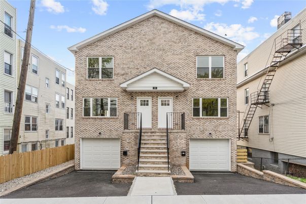 Attached, Exterior, Facade, Brick Facade, Rowhouse