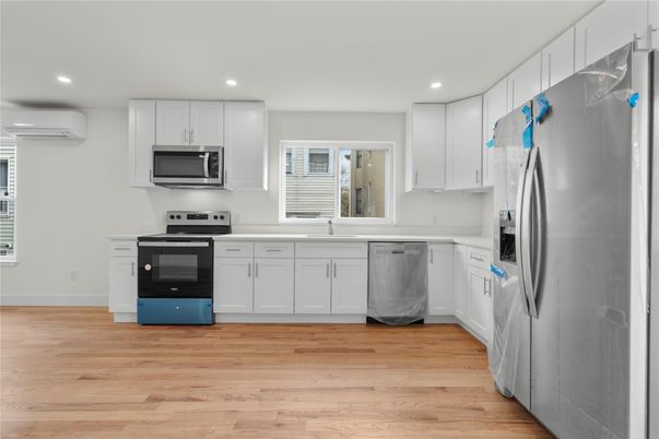 Interior, Kitchen, Recessed Lighting, Stainless Steel Appliances, Wood Texture Flooring