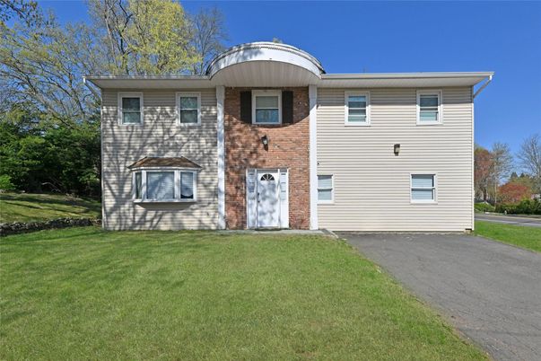 Exterior, Facade, Brick Facade, Raised Ranch