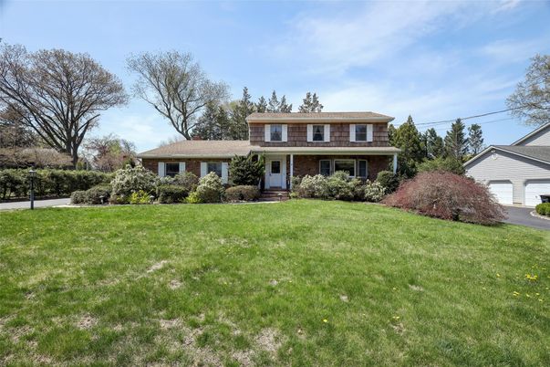 Attached, Backyard, Exterior, Facade, Brick Facade, Split Level