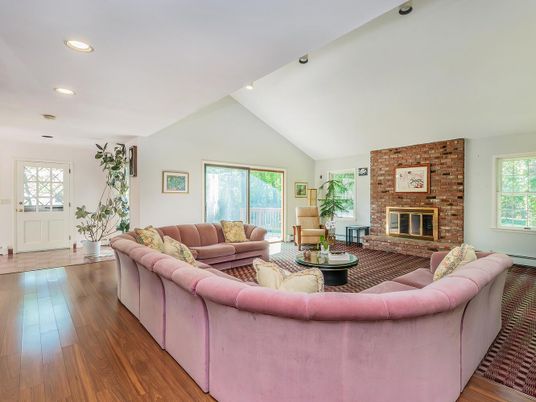 Fireplace, Interior, Living room, Recessed Lighting, Stone Walls, Wood Texture Flooring
