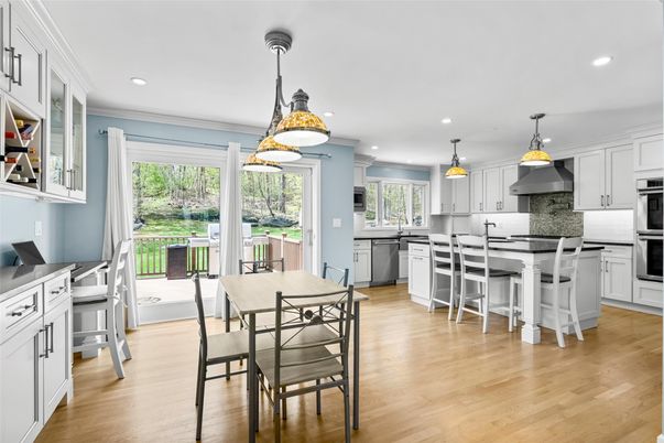 Dining room, Interior, Kitchen, Pendant Lights, Recessed Lighting, Stainless Steel Appliances, Wood Texture Flooring