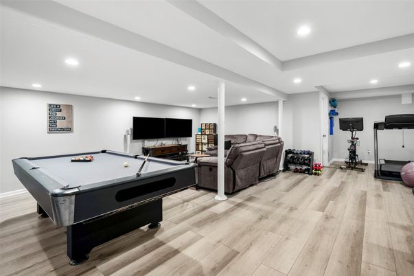 Billiard Table, Fitness Equipment, Game Room, Interior, Recessed Lighting, Wood Texture Flooring