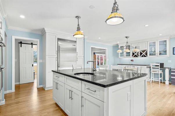 Dining room, Interior, Kitchen, Pendant Lights, Recessed Lighting, Stainless Steel Appliances, Wood Texture Flooring