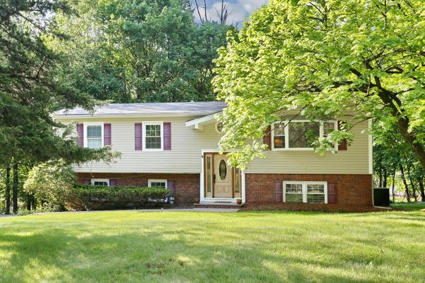 Exterior, Facade, Brick Facade, Raised Ranch