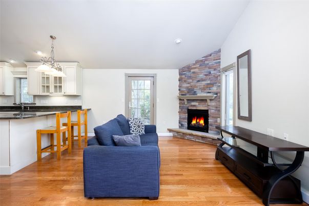 Fireplace, Interior, Kitchen, Living room, Pendant Lights, Recessed Lighting, Stone Walls, Wood Texture Flooring