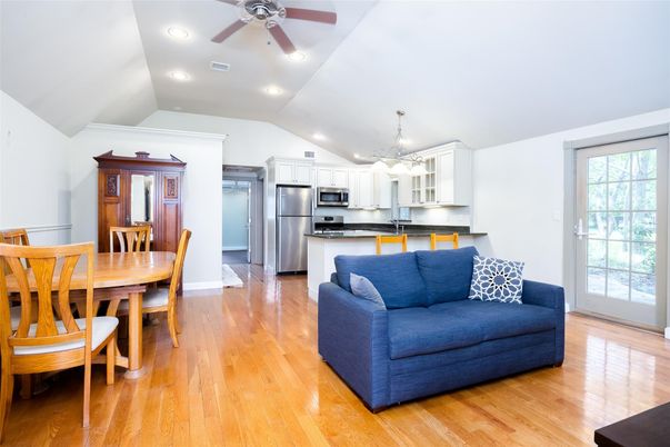 Dining room, Interior, Kitchen, Pendant Lights, Recessed Lighting, Stainless Steel Appliances, Wood Texture Flooring