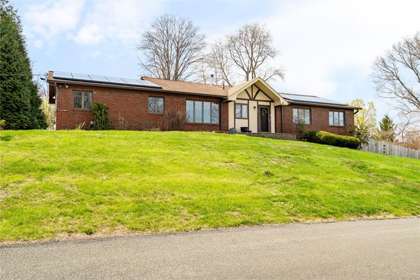 Exterior, Facade, Brick Facade, Solar Panels, Ranch