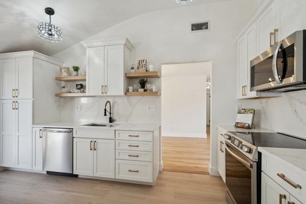 Interior, Kitchen, Marble Walls, Stainless Steel Appliances, Wood Texture Flooring