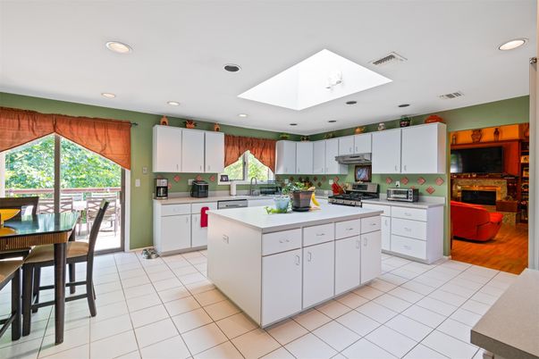 Fireplace, Interior, Kitchen, Living room, Recessed Lighting, Wood Texture Flooring