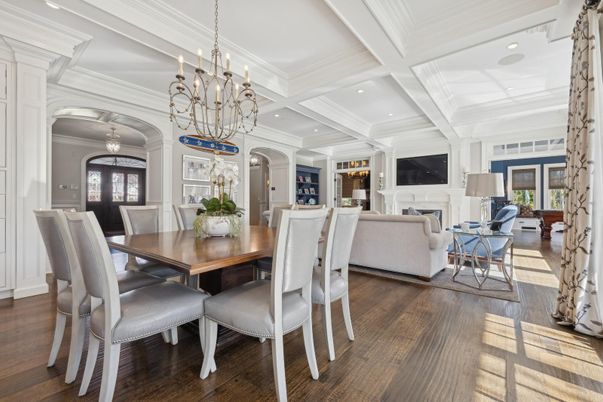 Chandelier, Dining room, Fireplace, Interior, Living room, Recessed Lighting, Wood Texture Flooring