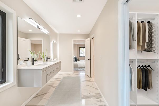 Bathroom, Dual Sink Vanities, Interior, Marble, Recessed Lighting, Walk-in Closets