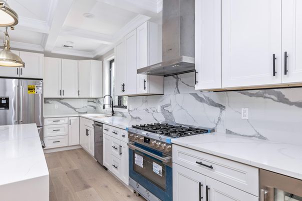Interior, Kitchen, Marble Walls, Recessed Lighting, Stainless Steel Appliances, Wood Texture Flooring