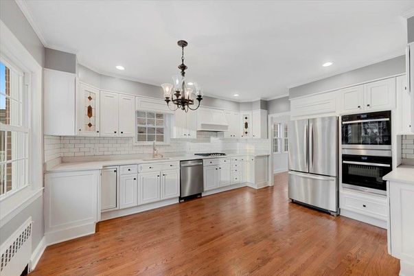 Chandelier, Interior, Kitchen, Pendant Lights, Recessed Lighting, Stainless Steel Appliances, Wood Texture Flooring
