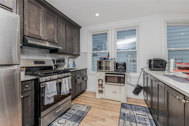 Interior, Kitchen, Recessed Lighting, Stainless Steel Appliances, Wood Texture Flooring