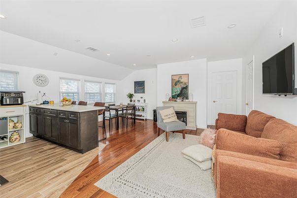 Dining room, Fireplace, Interior, Kitchen, Living room, Recessed Lighting, Wood Texture Flooring