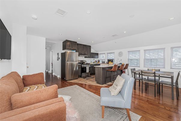 Dining room, Interior, Kitchen, Living room, Recessed Lighting, Stainless Steel Appliances, Wood Texture Flooring