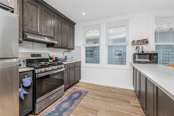 Interior, Kitchen, Recessed Lighting, Stainless Steel Appliances, Wood Texture Flooring