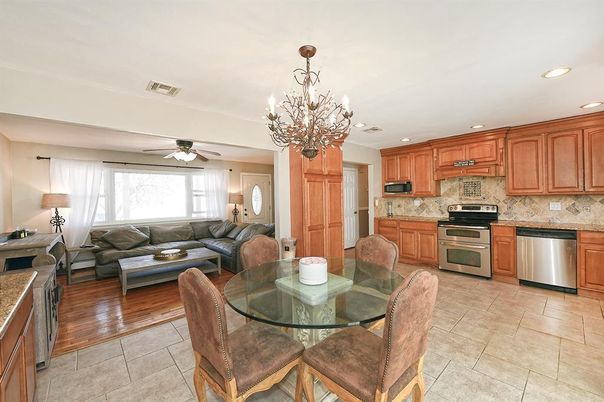 Chandelier, Dining room, Interior, Kitchen, Living room, Recessed Lighting, Stainless Steel Appliances, Wood Texture Flooring