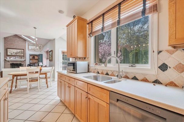 Dining room, Fireplace, Interior, Kitchen, Pendant Lights, Stainless Steel Appliances, Stone Walls