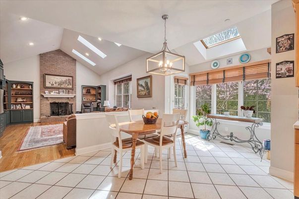 Dining room, Fireplace, Interior, Pendant Lights, Recessed Lighting, Stone Walls, Wood Texture Flooring