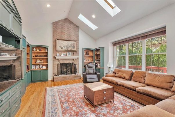 Fireplace, Interior, Living room, Recessed Lighting, Stone Walls, Wood Texture Flooring