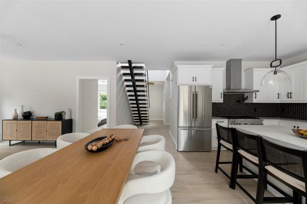 Dining room, Interior, Kitchen, Pendant Lights, Recessed Lighting, Stainless Steel Appliances, Wood Texture Flooring