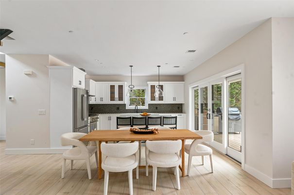 Dining room, Interior, Kitchen, Pendant Lights, Recessed Lighting, Stainless Steel Appliances, Wood Texture Flooring