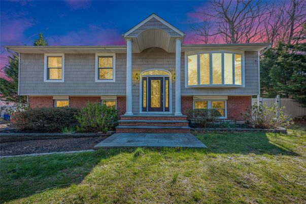 Exterior, Facade, Brick Facade, Raised Ranch