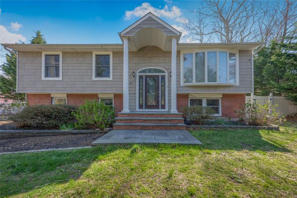 Exterior, Facade, Brick Facade, Raised Ranch