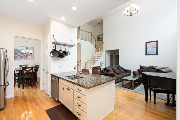 Chandelier, Dining room, Interior, Kitchen, Living room, Recessed Lighting, Wood Texture Flooring