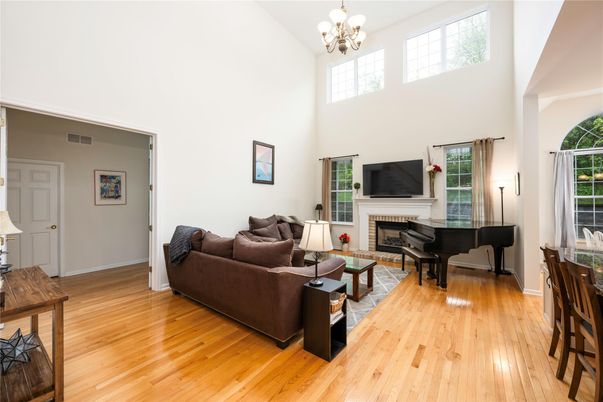 Chandelier, Fireplace, Interior, Living room, Piano, Wood Texture Flooring