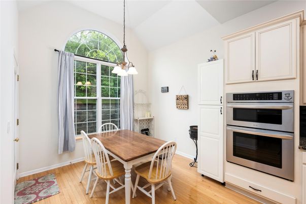 Dining room, Interior, Kitchen, Pendant Lights, Stainless Steel Appliances, Wood Texture Flooring