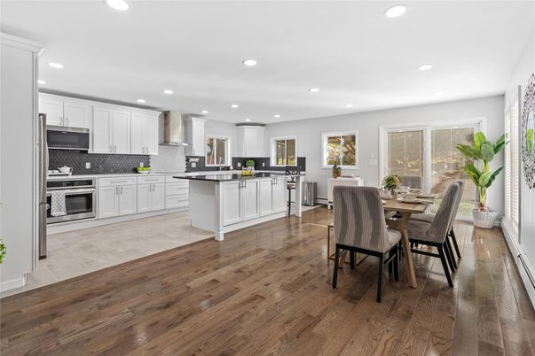 Dining room, Interior, Kitchen, Recessed Lighting, Stainless Steel Appliances, Wood Texture Flooring