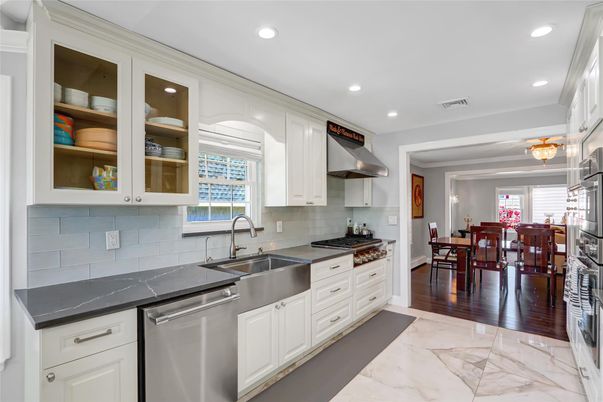Dining room, Interior, Kitchen, Marble, Recessed Lighting, Stainless Steel Appliances, Wood Texture Flooring