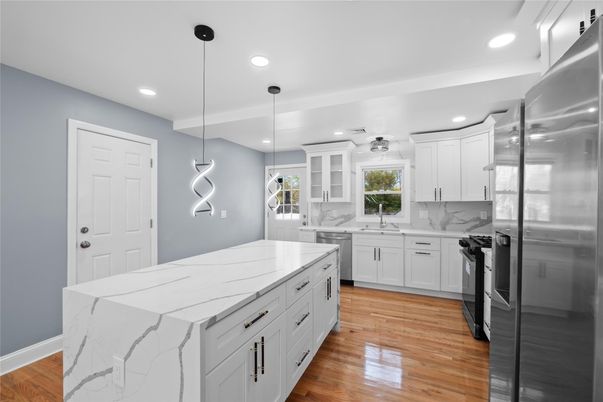 Interior, Kitchen, Pendant Lights, Recessed Lighting, Stainless Steel Appliances, Wood Texture Flooring