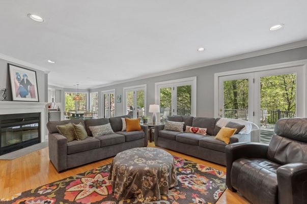Dining room, Fireplace, Interior, Living room, Pendant Lights, Recessed Lighting, Wood Texture Flooring