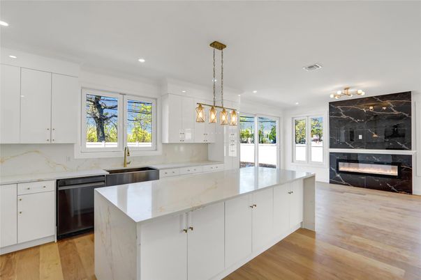 Fireplace, Interior, Kitchen, Marble Walls, Pendant Lights, Recessed Lighting, Wood Texture Flooring