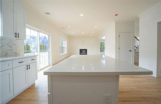 Fireplace, Interior, Kitchen, Recessed Lighting, Wood Texture Flooring