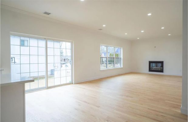 Empty room, Fireplace, Interior, Recessed Lighting, Wood Texture Flooring