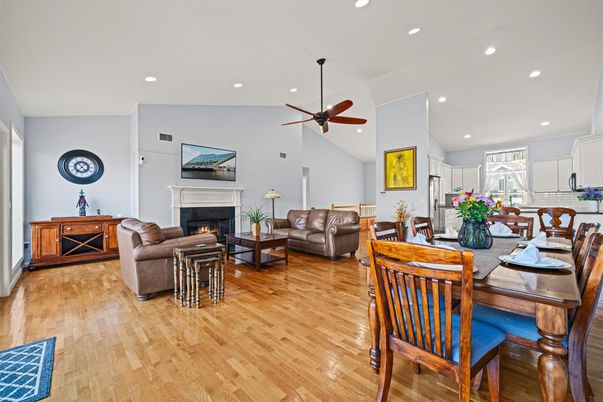 Dining room, Fireplace, Interior, Living room, Recessed Lighting, Wood Texture Flooring